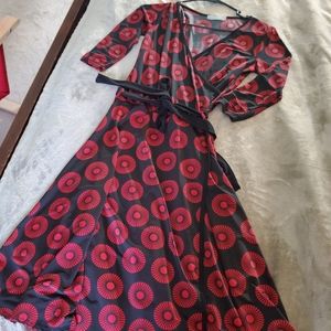 Beautiful top-crossed dress. Area Code size 4.